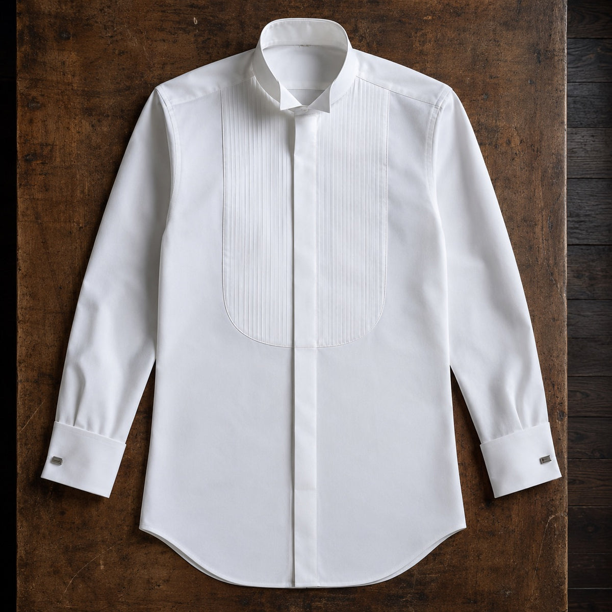 Dartmoor pleated-bib evening shirt — Tailored Shirts by CROWN TAILORING. flat lay, front.