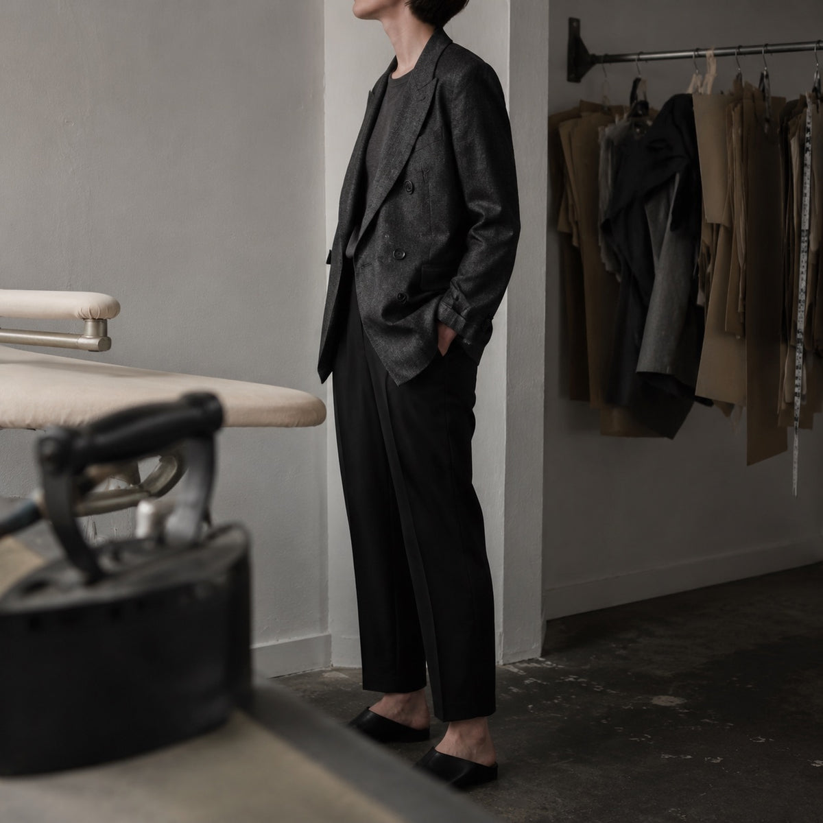 Dartmoor double-breasted suit jacket — Suit Jackets by CROWN TAILORING. shown on the model from the side.