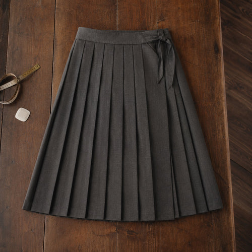 Ashdown box-pleated wrap skirt — Tailored Skirts by CROWN TAILORING. flat lay, front.